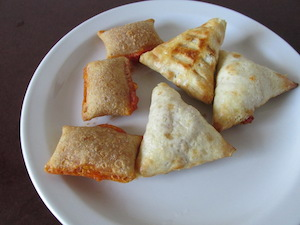 Illustration for article titled Frozen-Food Smackdown: Totino's Pizza Rolls Vs. Hot Pockets Snack Bites